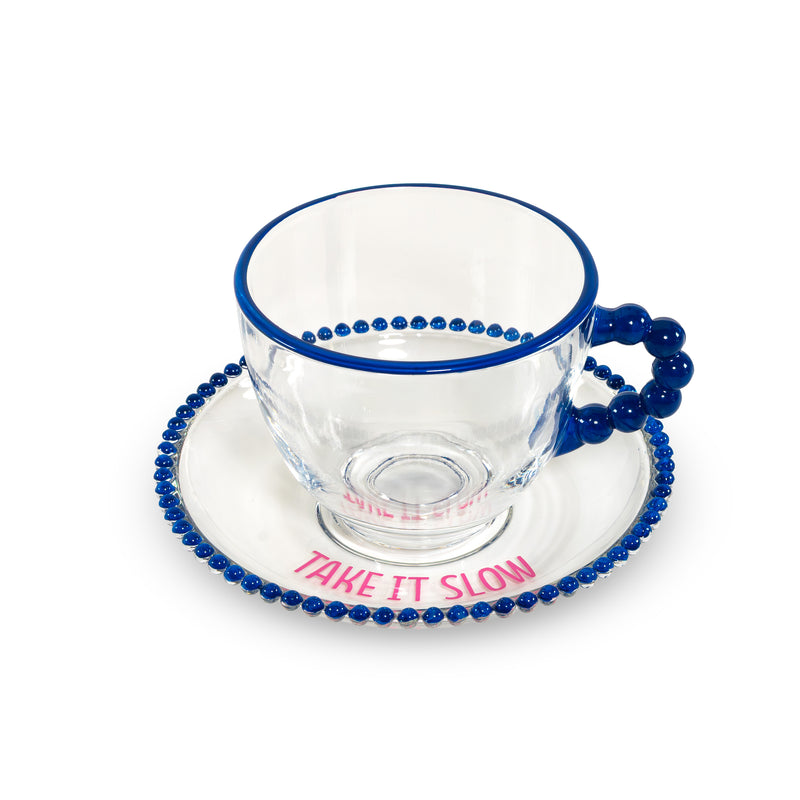 Lot de 2 tasses en verre WD LifeStyle de 230 ml avec soucoupes, décorations « Take it slow » et « Keep it chill », rose et bleu