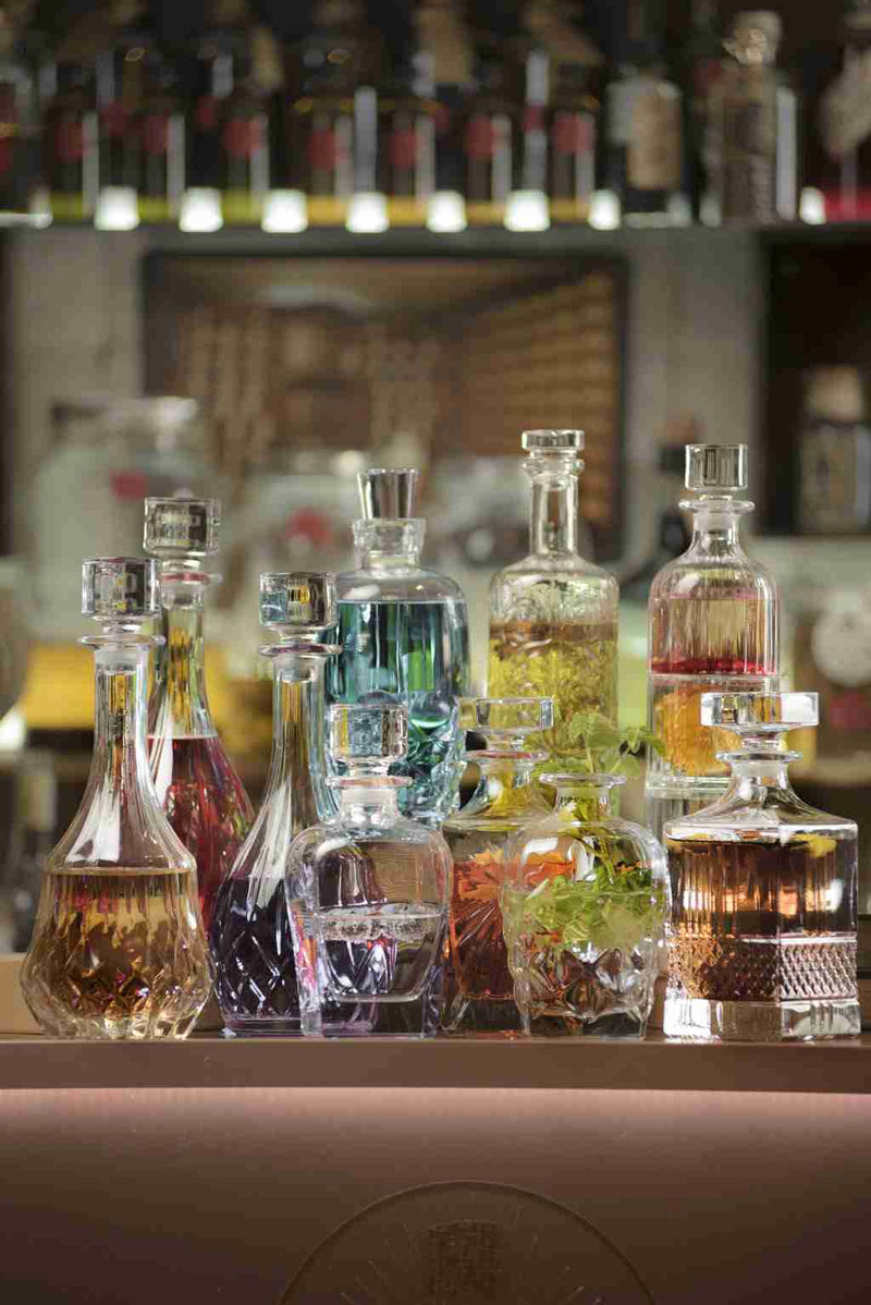 RCR Cristalleria Italiana Opera - Bouteille ronde avec bouchon cylindrique en verre cristal